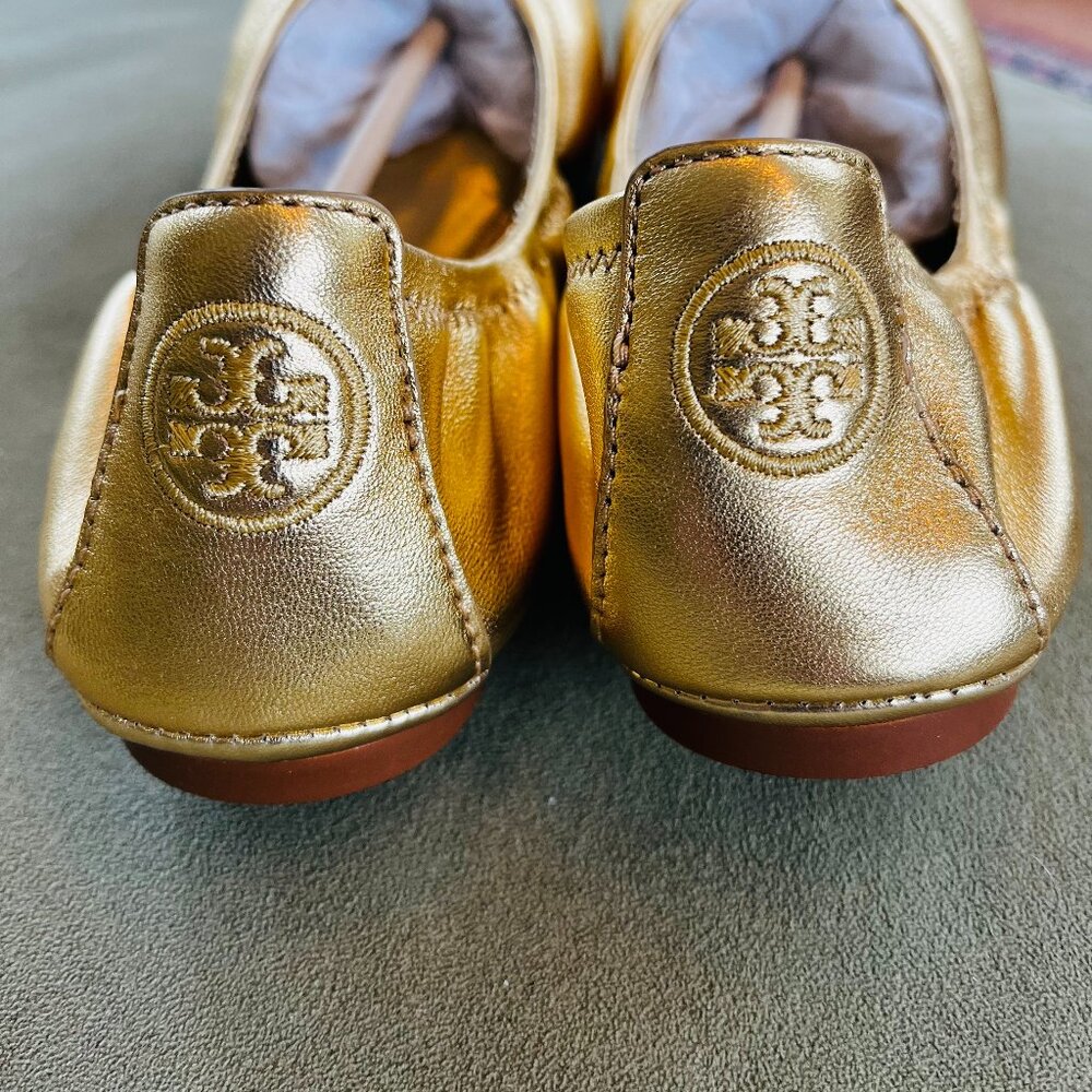 Tory Burch Gold Ballet Flats.